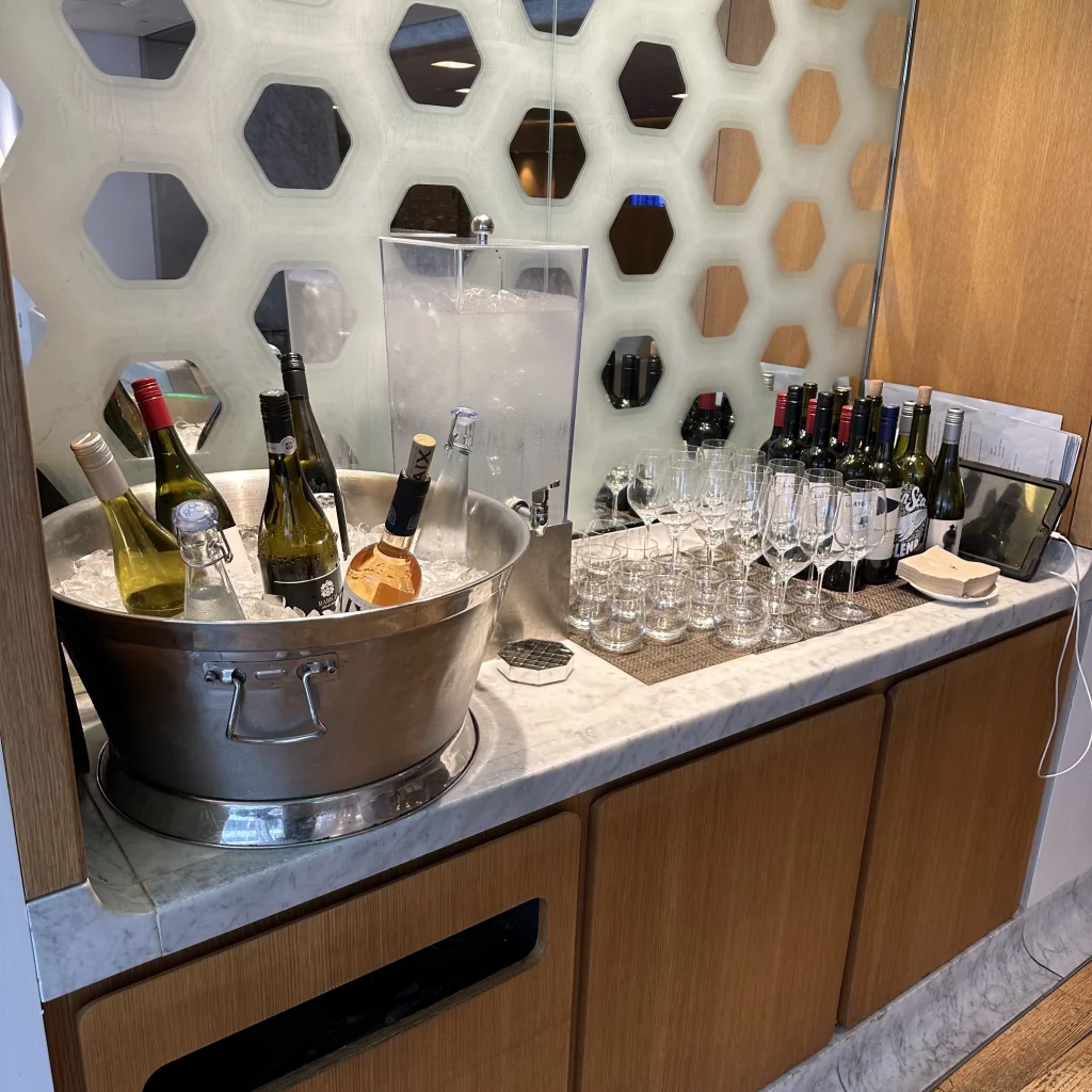 Self service water and alcohol section at Qantas First Class Lounge LAX