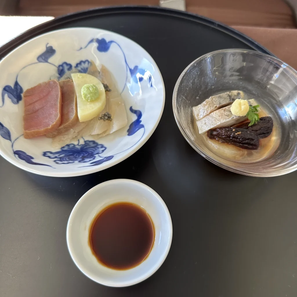 Japan Airlines first class passengers who picked the Japanese menu will receive a tuna and mackerel course