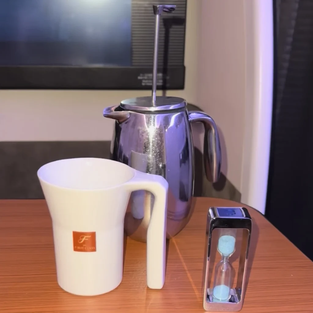 Japan Airlines cappuccino with hourglass timer