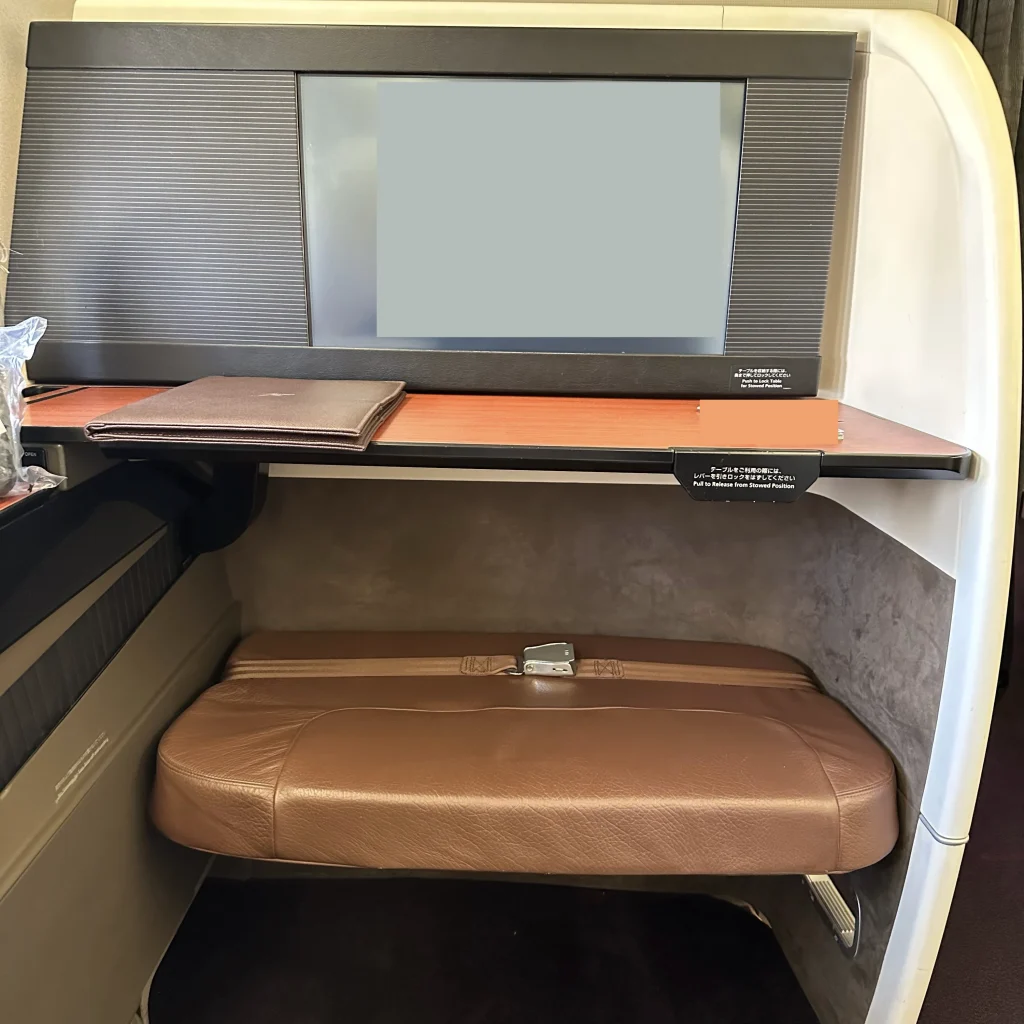 Japan Airlines First class seats feature a large TV and big foot rest