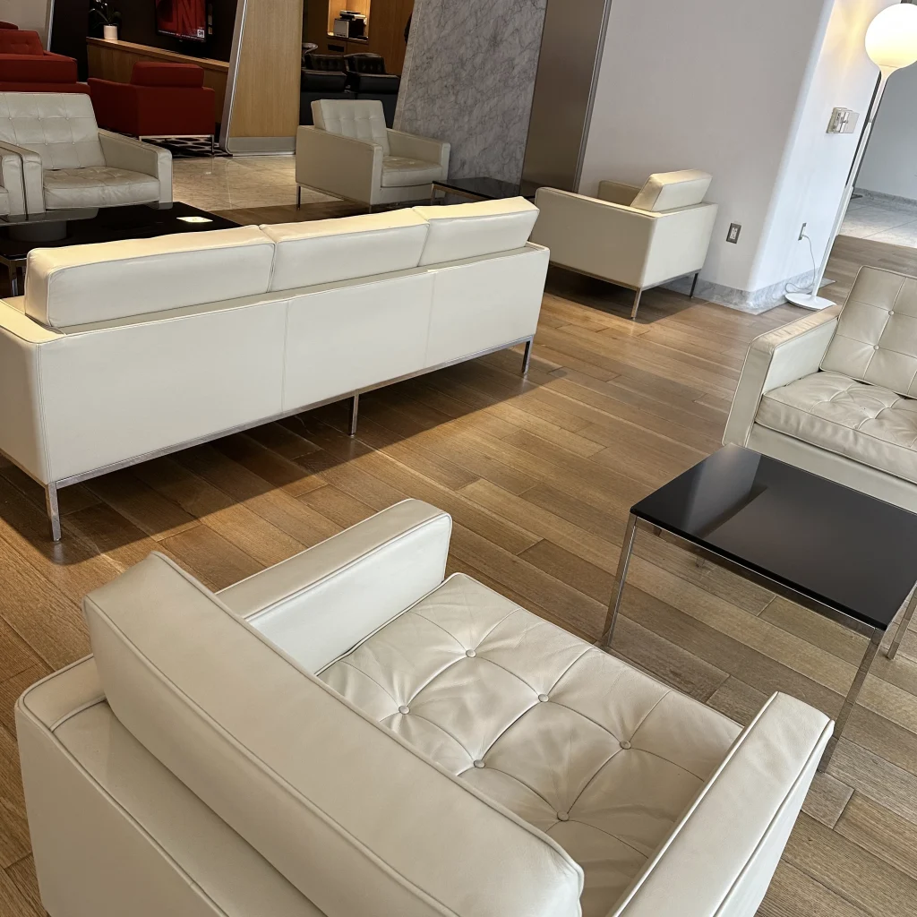 Couches and more seating at Qantas First Class Lounge LAX