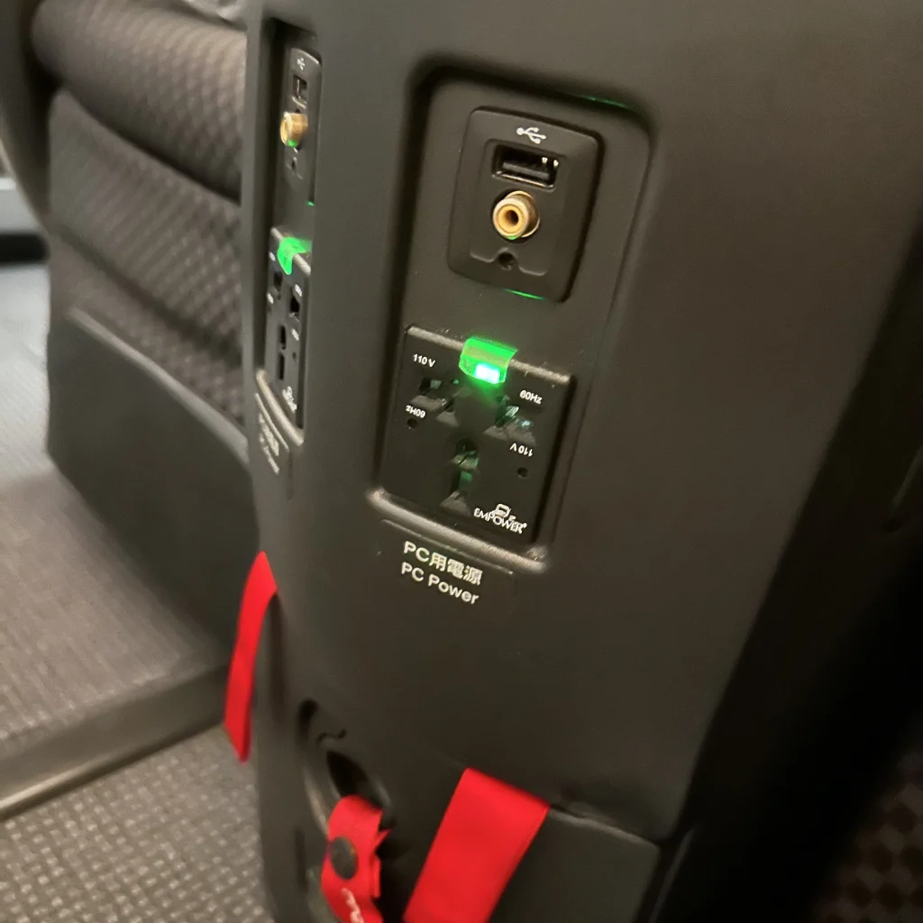 Each seat features a charging port and USB port