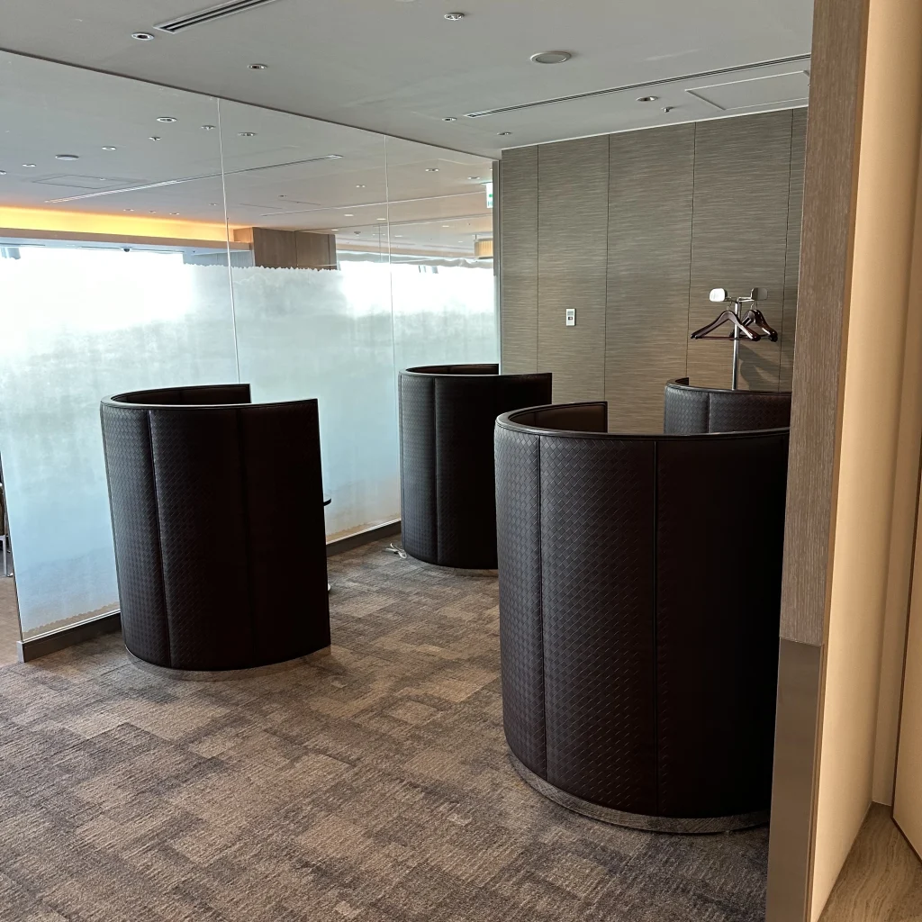 Seats with Privacy Partitions in Japan Airlines First Class Lounge
