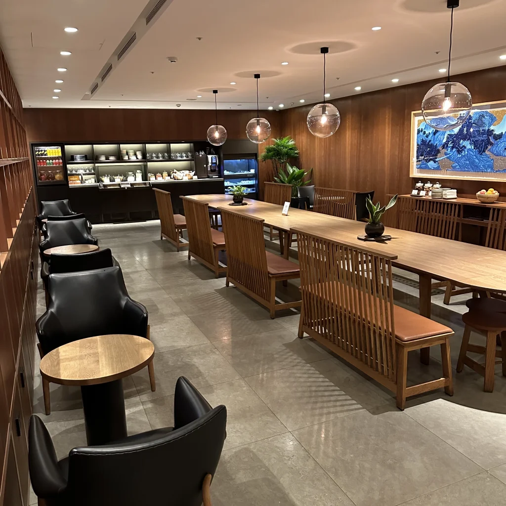 The Cathay Pacific Business Class Lounge at Taoyuan International Airport has additional lounge seating near the entrance