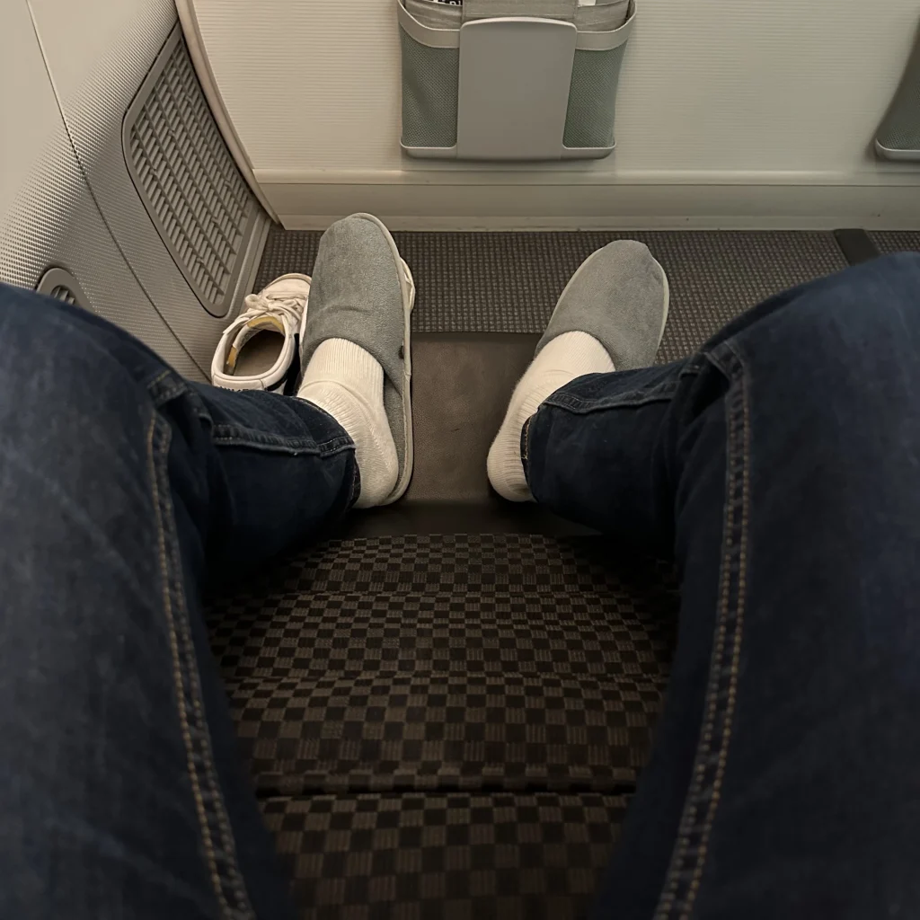 Business class passengers enjoy free slippers