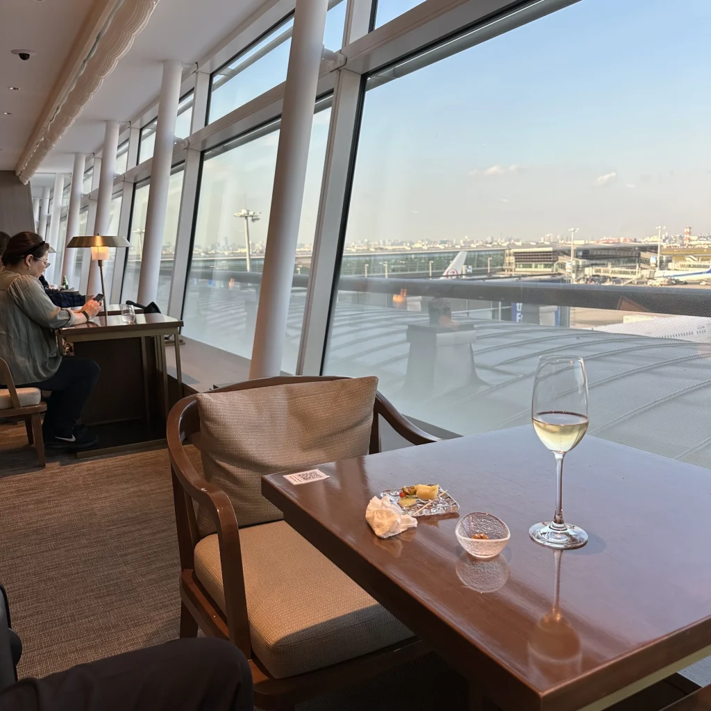 Seats that Look Out Towards Runway in Japan Airlines First Class Lounge