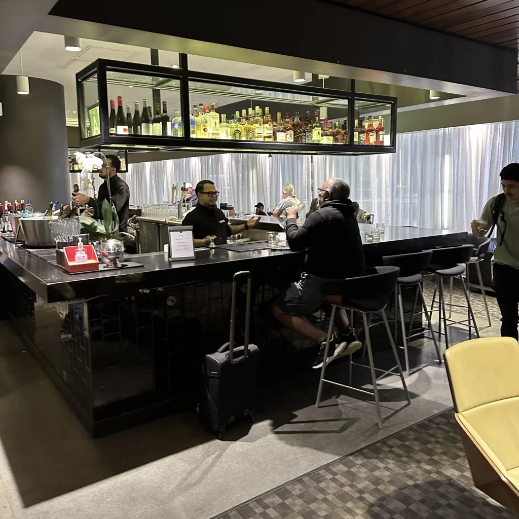 The OneWorld Lounge at LAX has baristas working at their bar