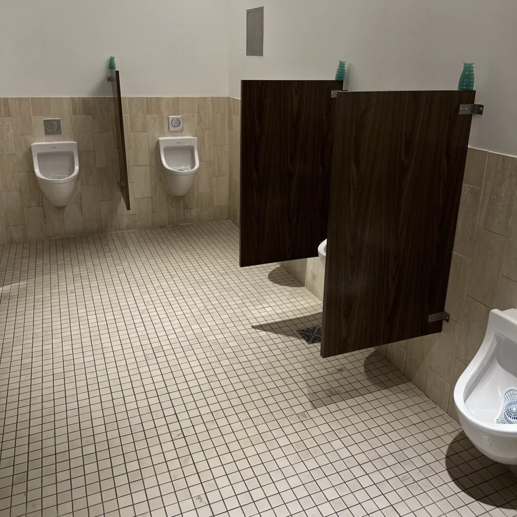 The OneWorld Lounge at LAX has multiple urinal stalls