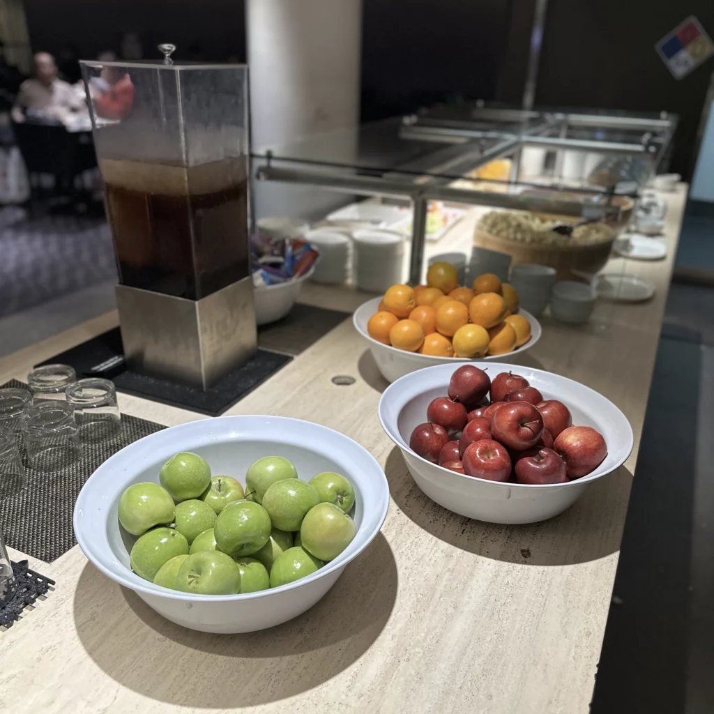 The OneWorld Lounge at LAX offers fruits like apples and oranges