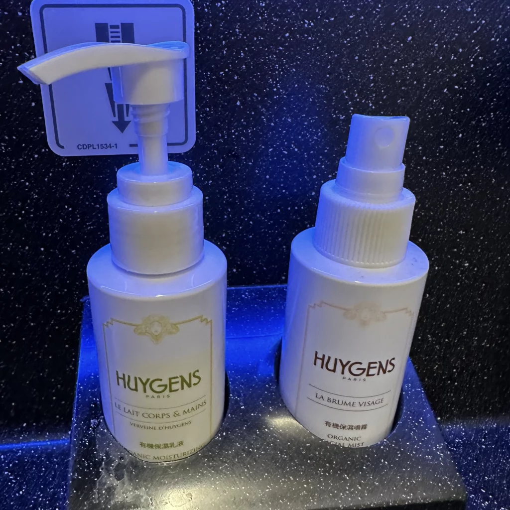 Starlux business class from Los Angeles to Taipei bathroom has Huygens branded soaps and creams