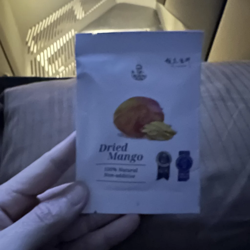 Starlux business class from Los Angeles to Taipei gives snacks like dried mango