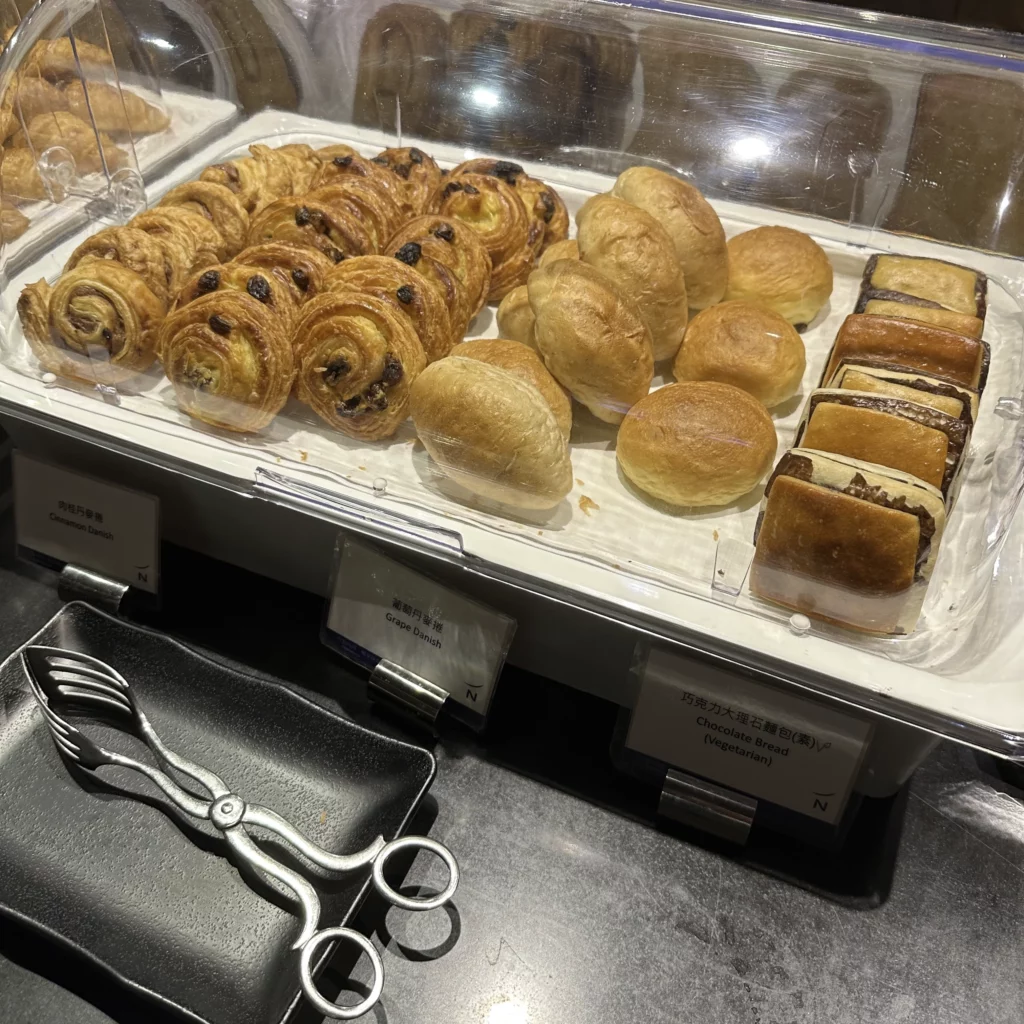 The China Airlines VIP Lounge in Terminal 1 of Taoyuan International Airport has different pastries and breads