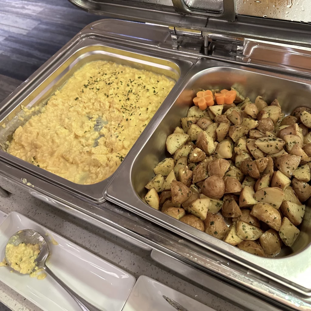 The China Airlines VIP Lounge in Terminal 2 of Taoyuan International Airport has western breakfast options like scrambled eggs and potatoes