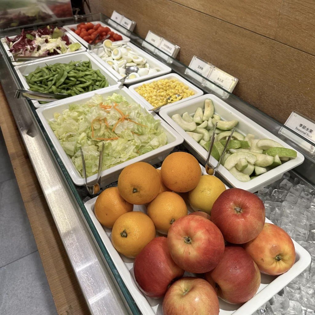 The China Airlines VIP Lounge in Terminal 2 of Taoyuan International Airport has lots of side dishes like fruits, vegetables, and hard-boiled eggs