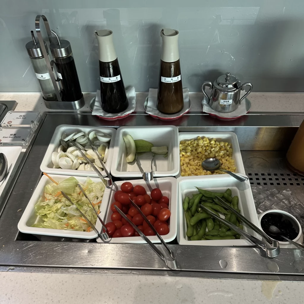 The China Airlines Dynasty Lounge has a good condiment selection with tomatoes, corn, and sauces