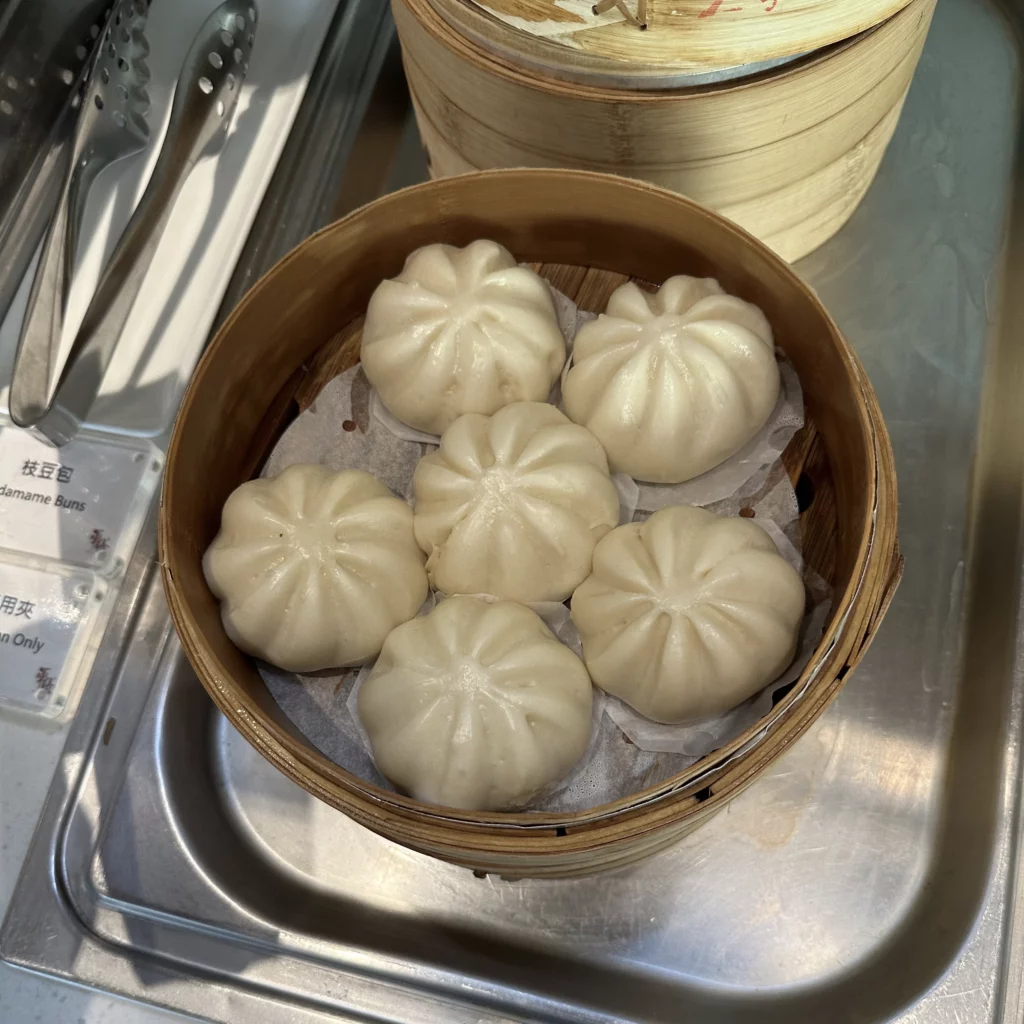 The China Airlines Dynasty Lounge has bamboo steamers with buns