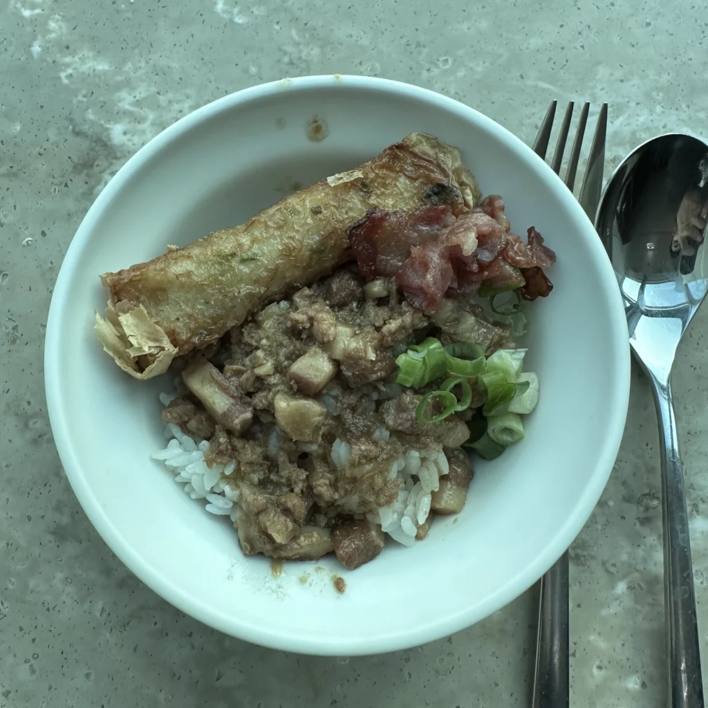 The Oriental Club Lounge at Taoyuan International Airport serves braised pork over rice