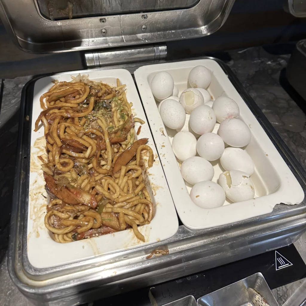 The Plaza Premium Lounge Zone A at Taoyuan International Airport in Taipei has lots of dining options like fried noodles and hardboiled eggs