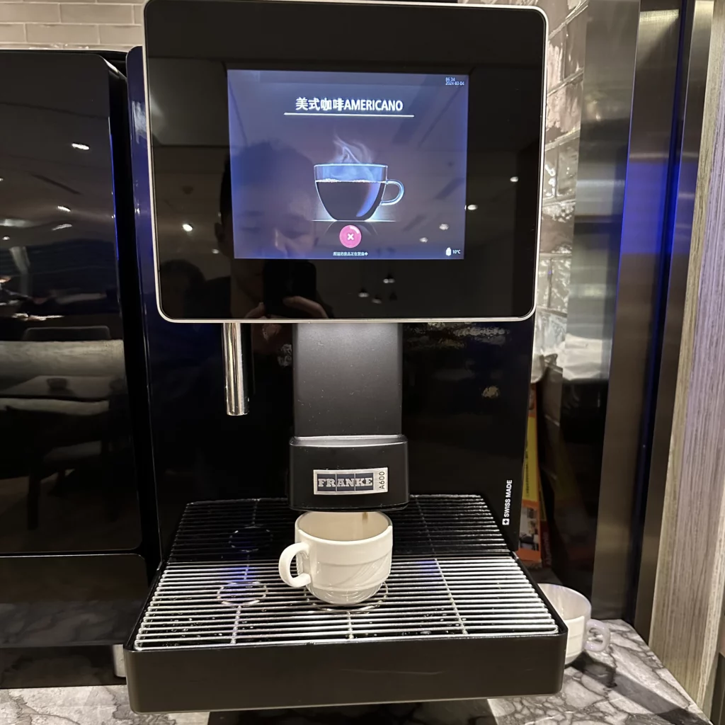 The Plaza Premium Lounge Zone A at Taoyuan International Airport in Taipei has an automatic coffee machine