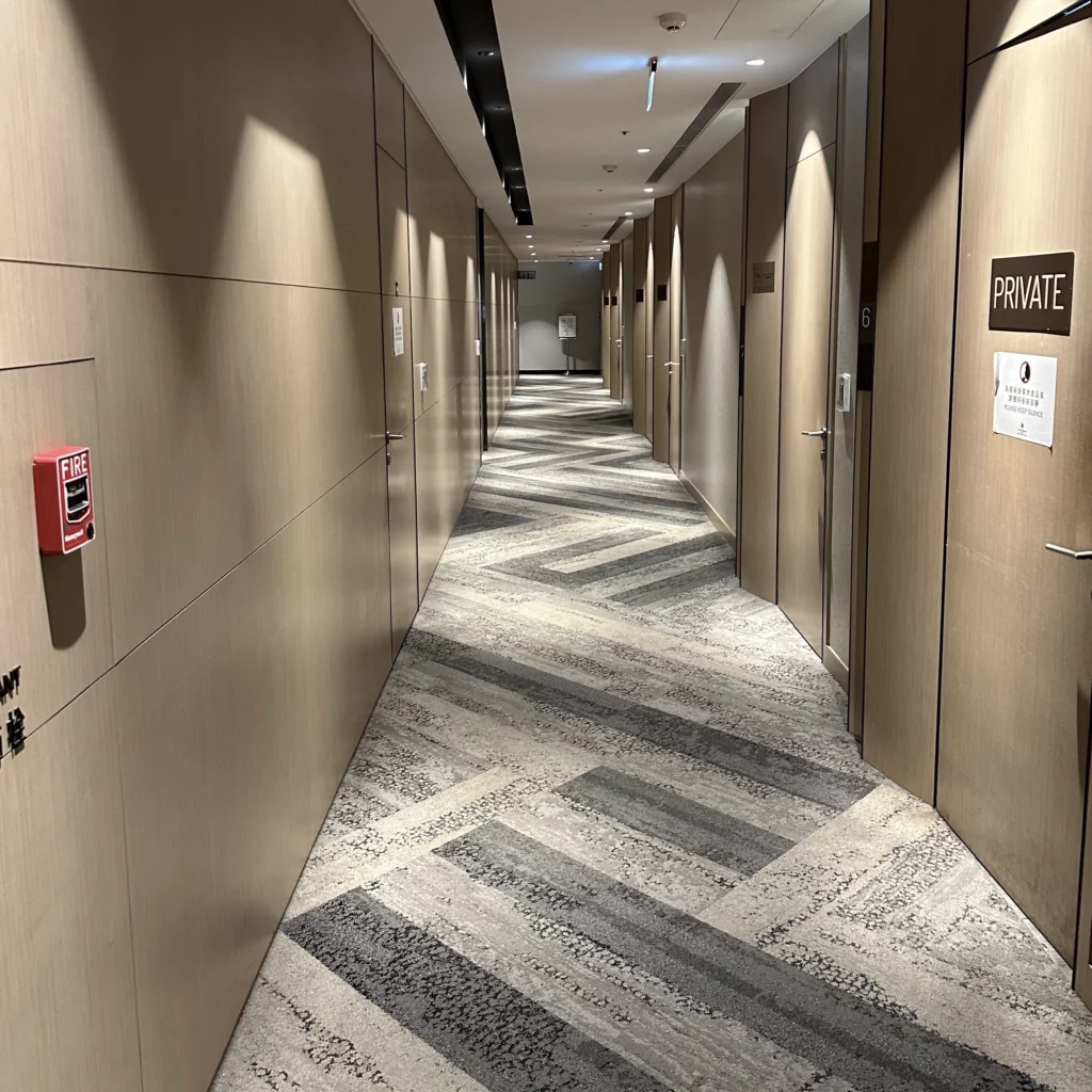 The Plaza Premium Lounge Zone A at Taoyuan International Airport in Taipei has 2 hallways that take you from the front of the lounge to the back
