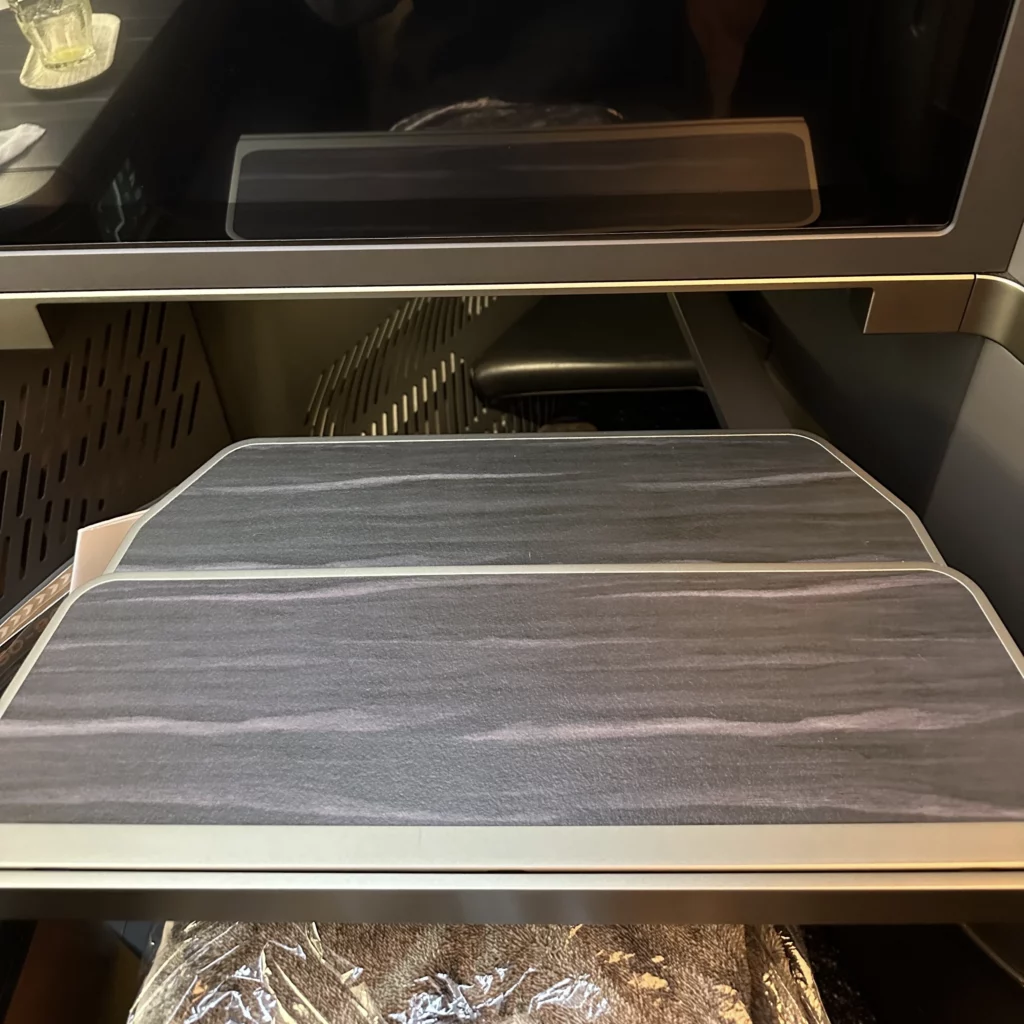 Starlux business class from Los Angeles to Taipei has an extendable, folding dining table
