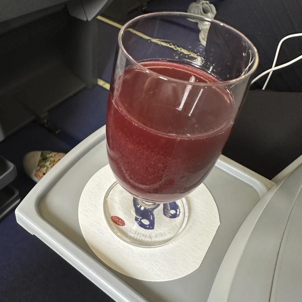 China Airlines A330-300 Business Class serves blueberry juice for its pre-departure drink