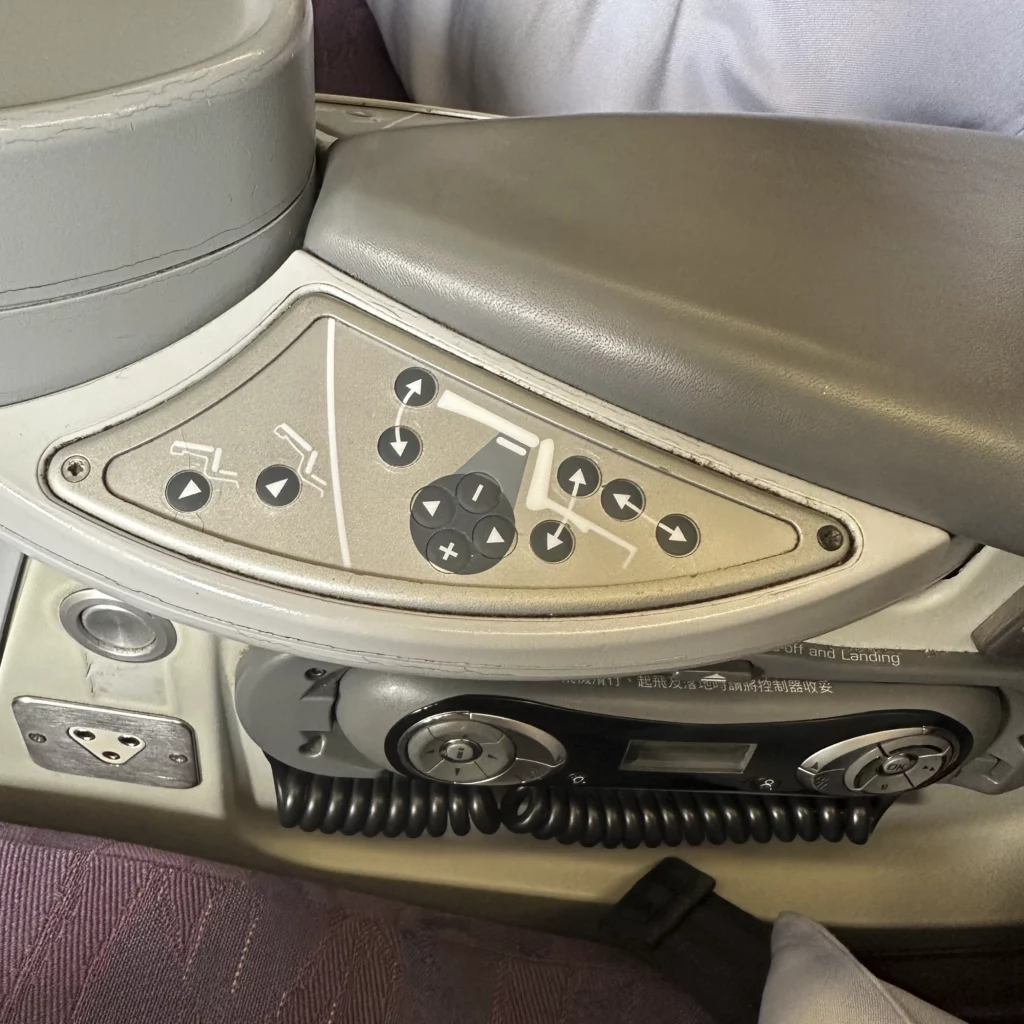 China Airlines A330-300 Business Class Cabin has a really outdated TV remote and seat controls