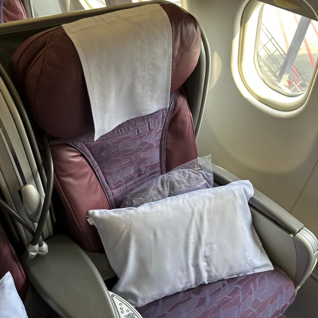 China Airlines A330-300 Business Class Cabin has dirty and old recliner seats