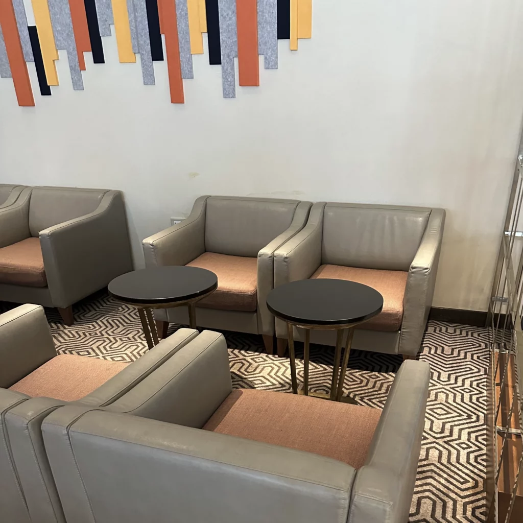 The Singapore Airlines SilverKris Lounge in Bangkok Suvarnabhumi Airport predominantly uses gray lounge chairs for its seating options