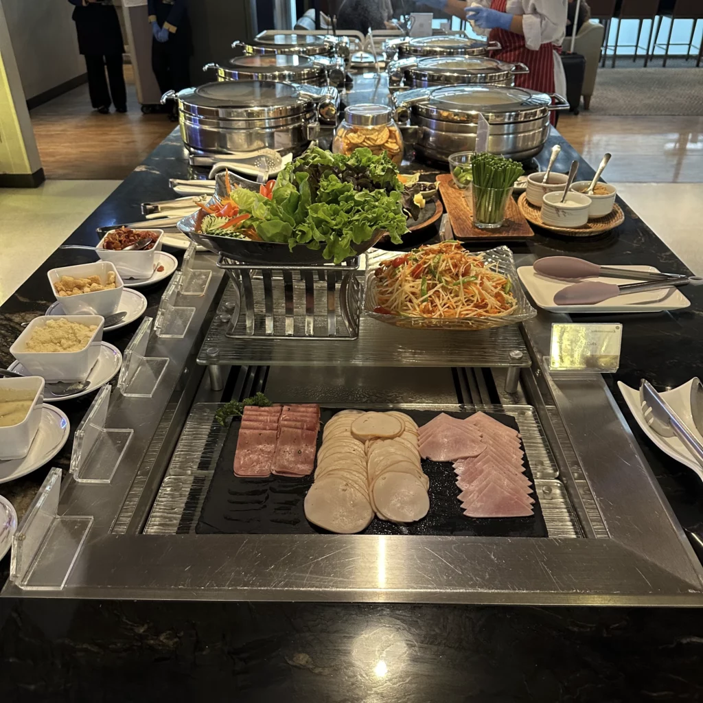 The Singapore Airlines SilverKris Lounge in Bangkok Suvarnabhumi Airport has an impressive center island food spread