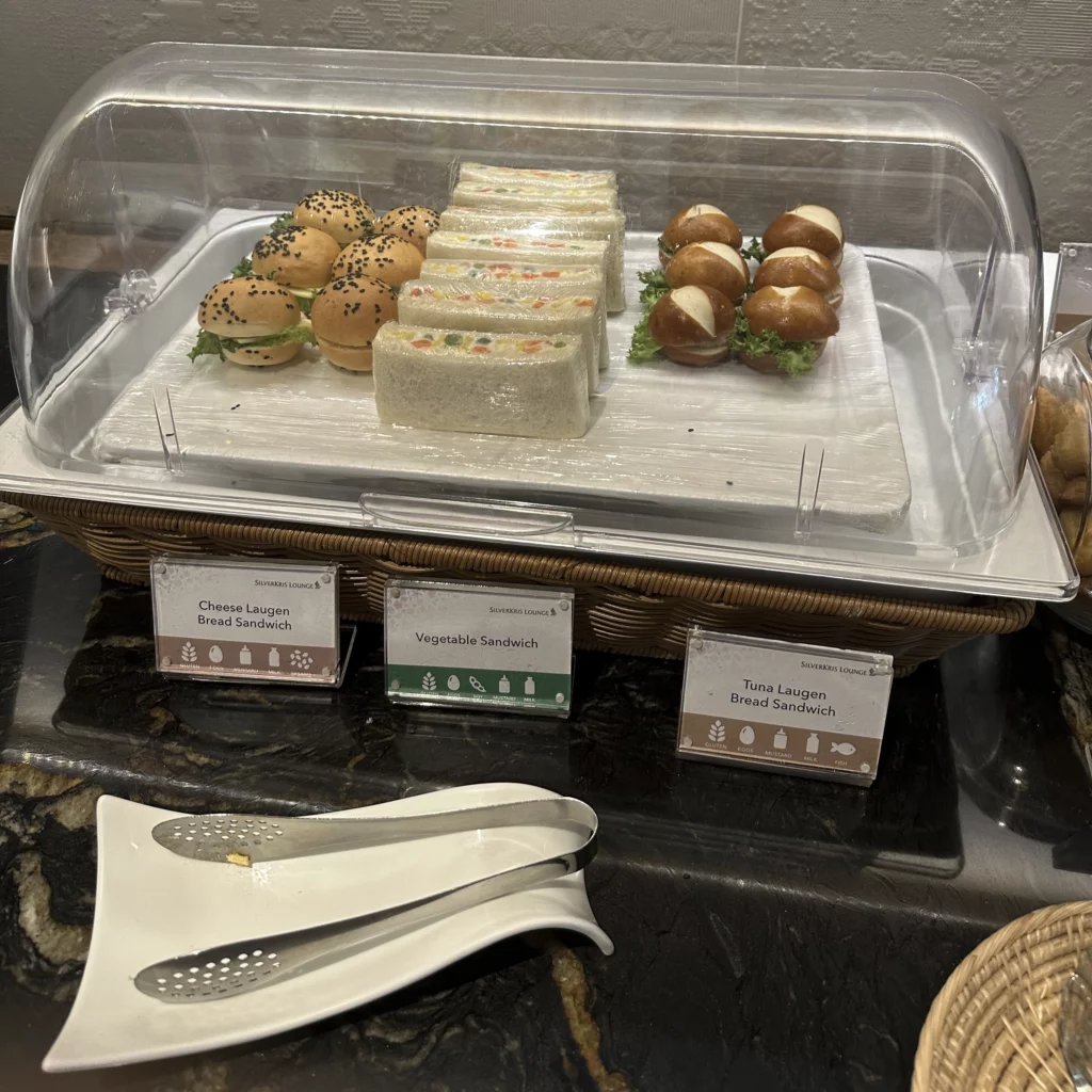 The Singapore Airlines SilverKris Lounge in Bangkok Suvarnabhumi Airport has a cute sandwich platter with various sandwiches