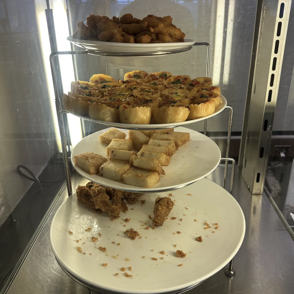 The Singapore Airlines SilverKris Lounge in Bangkok Suvarnabhumi Airport has a heated cabinet full of finger foods