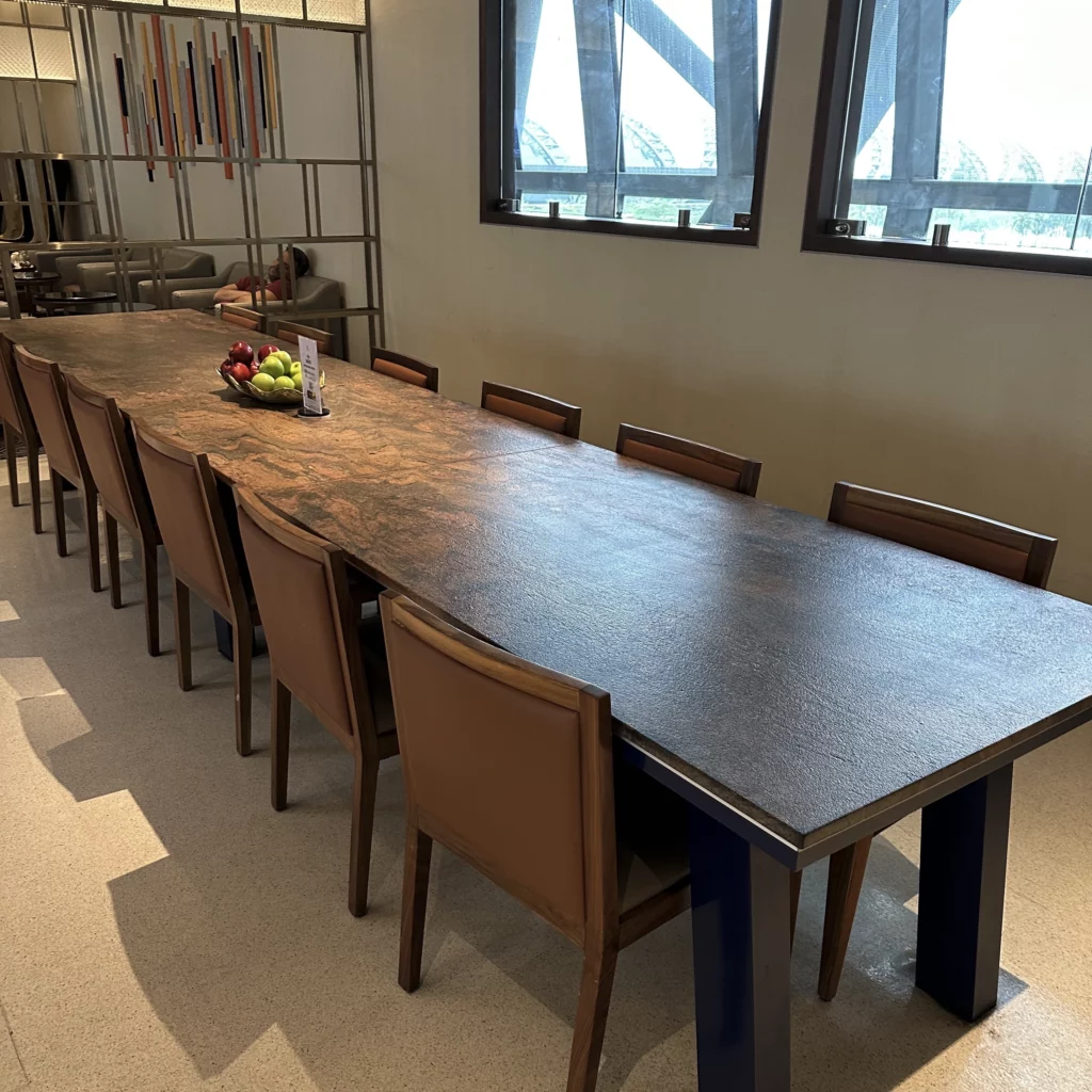 The Singapore Airlines SilverKris Lounge in Bangkok Suvarnabhumi Airport has a single, large communal dining table