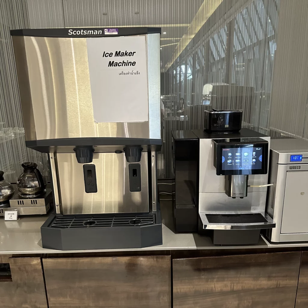 The Thai Airways Royal Orchid Prestige Business Class Lounge in Bangkok Suvarnabhumi Airport has an ice machine and automatic cofee machine