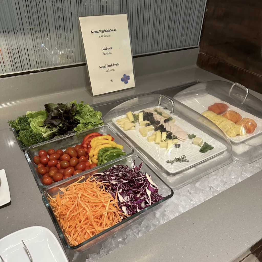The Thai Airways Royal Orchid Prestige Business Class Lounge in Bangkok Suvarnabhumi Airport has a salad bar and fresh fruits