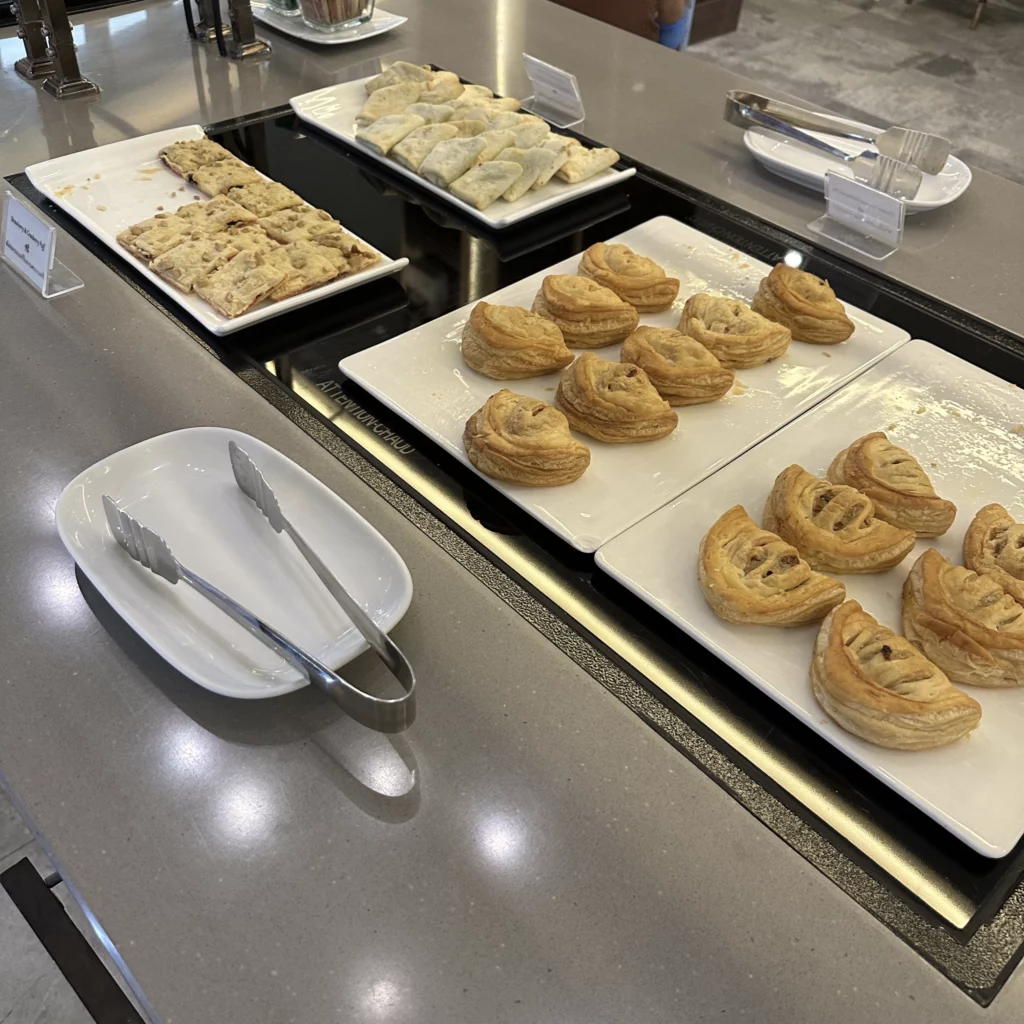 The Thai Airways Royal Orchid Prestige Business Class Lounge in Bangkok Suvarnabhumi Airport serves pastries and wraps