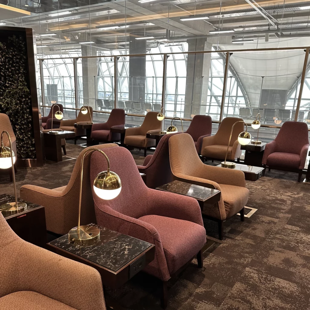 The Thai Airways Royal Orchid Prestige Business Class Lounge in Bangkok Suvarnabhumi Airport is a huge space with tons of lounge chairs